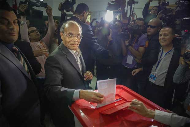 Sousse - Passage  tabac dun jeune homme, lors du vote de Moncef Marzouki (vido)