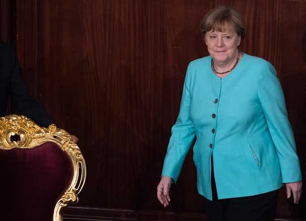 Angela Merkel flicite Kas Saed